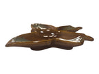 Ceramic leaf-shaped dish on a white background