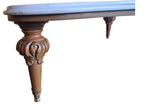 Vintage biomorphic white marble coffee table with carved walnut-toned wood legs and brass foot caps.