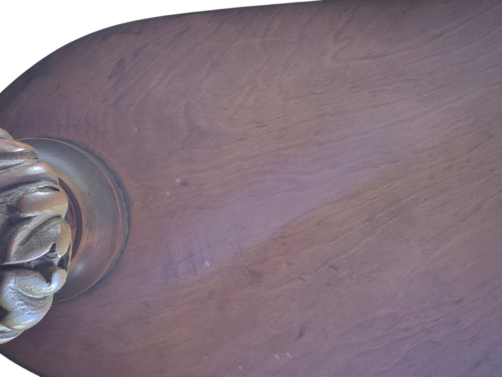 Vintage biomorphic white marble coffee table with carved walnut-toned wood legs and brass foot caps.