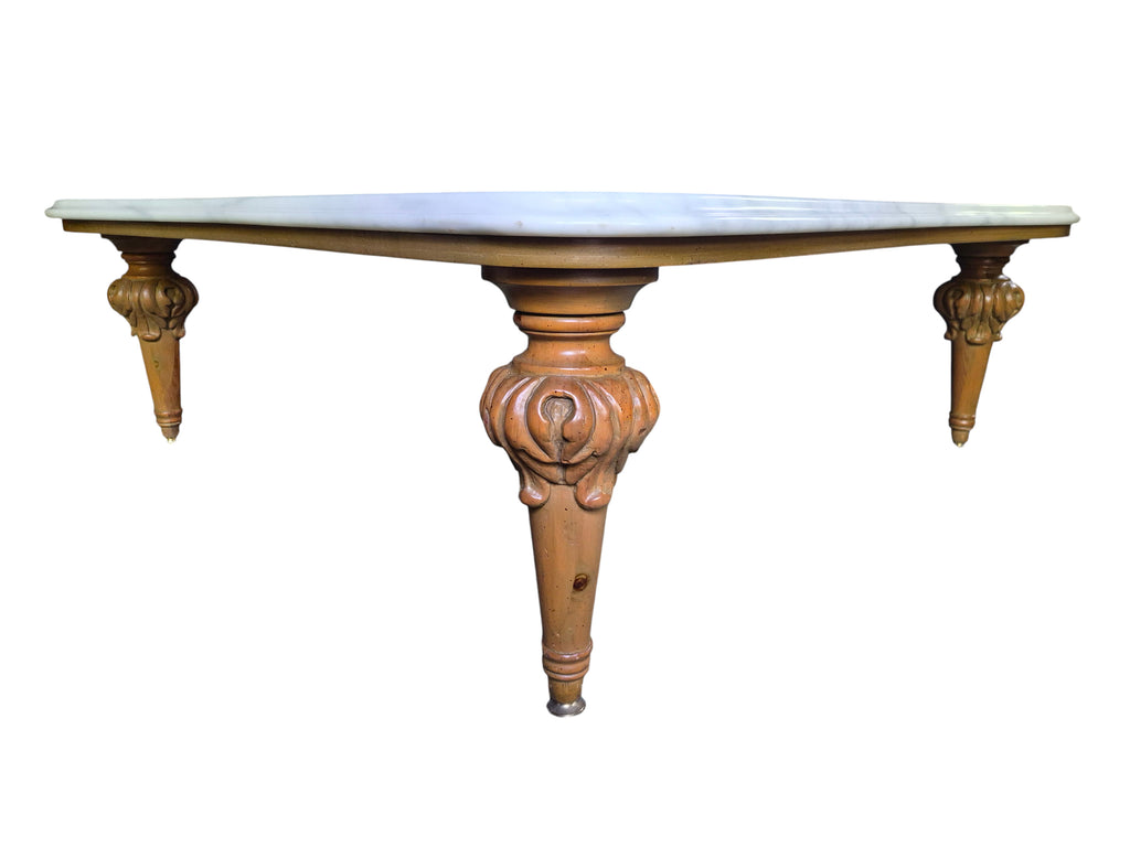 Vintage biomorphic white marble coffee table with carved walnut-toned wood legs and brass foot caps.