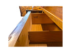 A vintage mid-century modern Lane Pueblo oak credenza featuring Brutalist geometric carved wood drawer fronts. Displays the Lane marking of authenticity in the front top left drawer.
