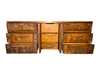 Front view of a vintage mid-century modern Lane Pueblo oak credenza featuring Brutalist geometric carved wood drawer fronts.