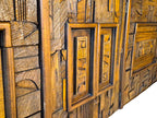 A vintage mid-century modern Lane Pueblo oak credenza featuring Brutalist geometric carved wood drawer fronts.