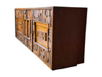 A vintage mid-century modern Lane Pueblo oak credenza featuring Brutalist geometric carved wood drawer fronts.