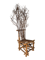 Vintage, handmade rustic twig chair in a right-front view featuring tall, branching backrest, slatted branch seat, and cross-braced legs. Made from raw branches with unpeeled bark. Sold vintage as-is in very good condition.