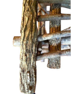 Vintage, handmade rustic twig chair in a close-up detail view featuring tall, branching backrest, slatted branch seat, and cross-braced legs. Made from raw branches with unpeeled bark. Sold vintage as-is in very good condition.