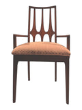 Mid Century Modern Broyhill Brasilia walnut arm dining chair in a front view. Features a signature cathedral slatted back and original beige geometric upholstered seat. Vintage as-is, gently refreshed, as part of a set of six.