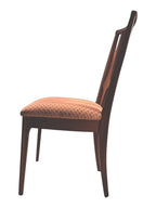 Mid Century Modern Broyhill Brasilia walnut side dining chair in a left profile view. Features a signature cathedral slatted back and original beige geometric upholstered seat. Vintage as-is, gently refreshed, as part of a set of six.