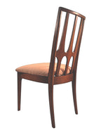 Mid Century Modern Broyhill Brasilia walnut side dining chair in a left-back view. Features a signature cathedral slatted back and original beige geometric upholstered seat. Vintage as-is, gently refreshed, as part of a set of six.