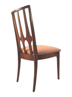 Mid Century Modern Broyhill Brasilia walnut side dining chair in a back-right view. Features a signature cathedral slatted back and original beige geometric upholstered seat. Vintage as-is, gently refreshed, as part of a set of six.