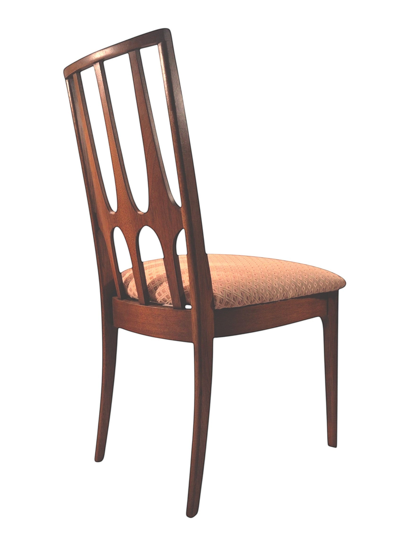 Mid Century Modern Broyhill Brasilia walnut side dining chair in a back-right view. Features a signature cathedral slatted back and original beige geometric upholstered seat. Vintage as-is, gently refreshed, as part of a set of six.