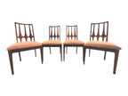 Mid Century Modern Broyhill Brasilia walnut side dining chairs in a, a set of four arranged side by side. Features a signature cathedral slatted back and original beige geometric upholstered seat. Vintage as-is, gently refreshed, as part of a set of six.