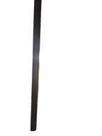 Curated Vintage Design large black framed wall art shown from a side profile view on a white surface.