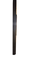 Side profile of a Curated Vintage Design large black framed wall art piece with a professional dust cover backing.