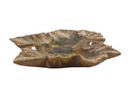 Curated Vintage Design leaf-shaped ceramic dish with multi-tonal green, brown, and yellow glaze. Glossy finish.