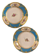 Curated Vintage Design ornate turquoise porcelain plate with floral accents and gold filigree. Scalloped edge.