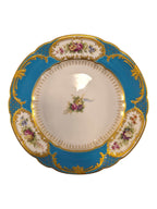 Curated Vintage Design ornate turquoise porcelain plate with gold filigree, floral bouquets, and scalloped gilded rim.