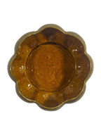 Curated Vintage Design scalloped ceramic serving bowl with amber interior and seafoam green exterior glaze.