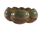 Curated Vintage Design scalloped ceramic serving bowl with brown exterior base and seafoam green rim, amber interior.
