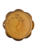 Curated Vintage Design scalloped ceramic serving bowl with amber interior and brown-to-seafoam green exterior glaze.